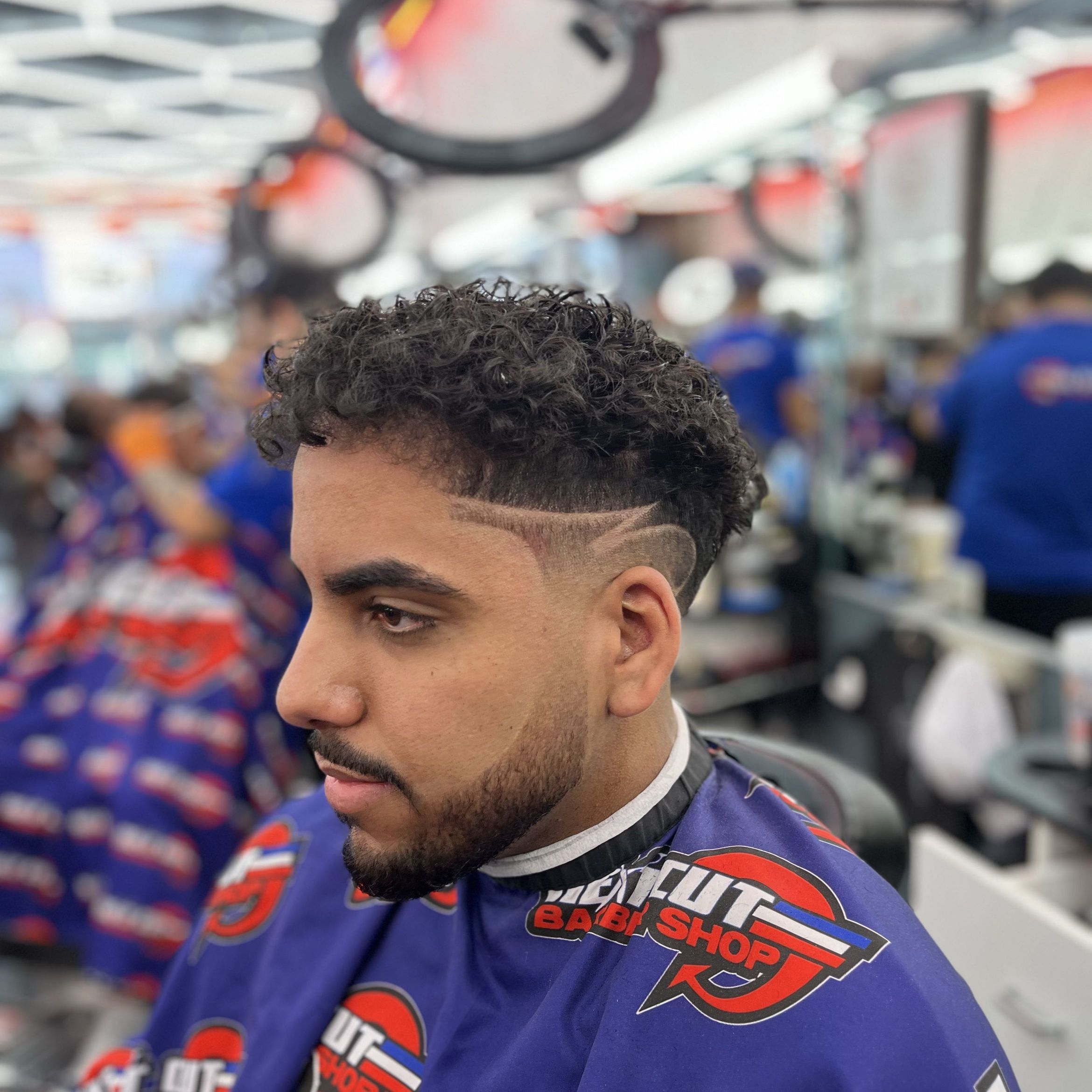 Curly-top fade with line-up