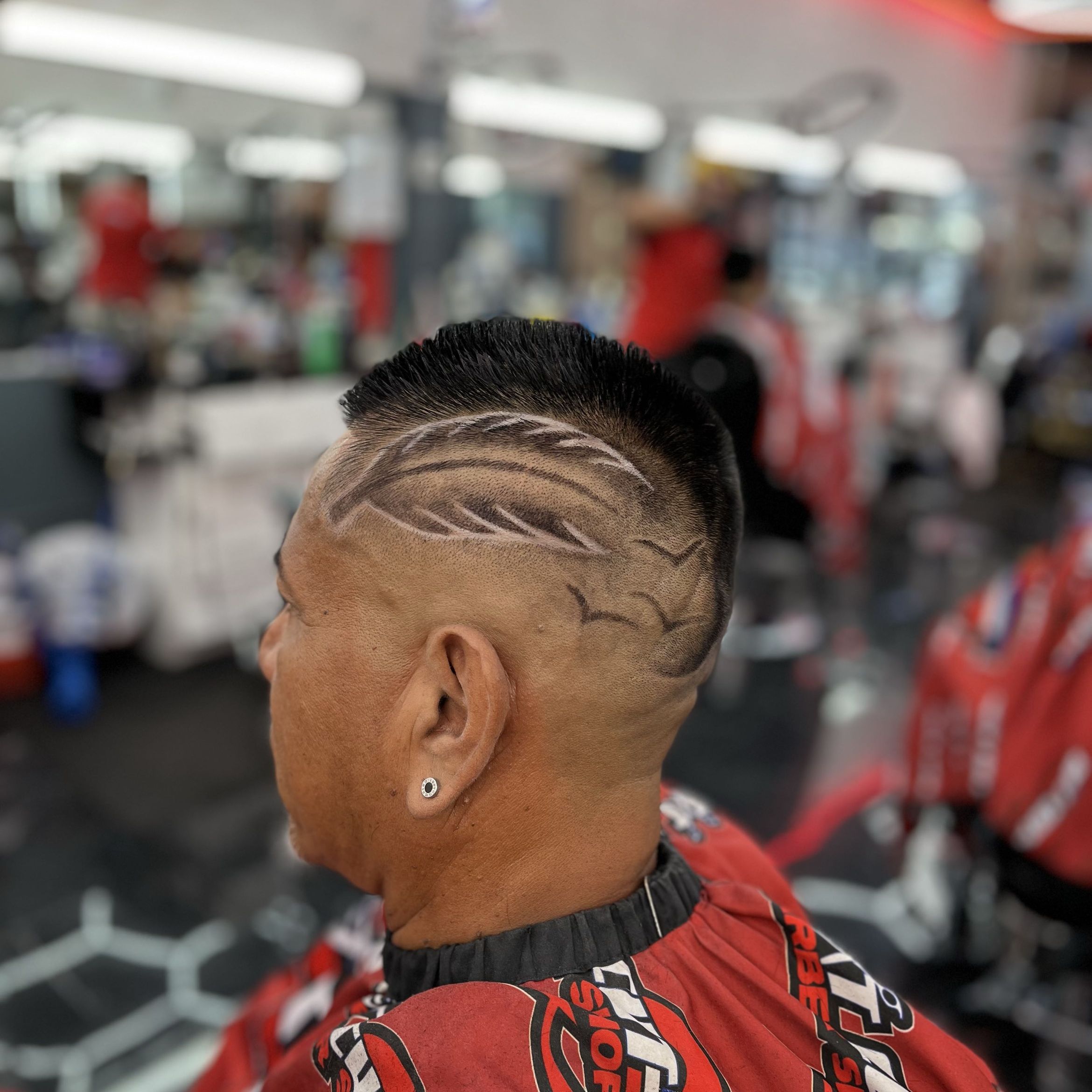 Mohawk with intricate shaved design