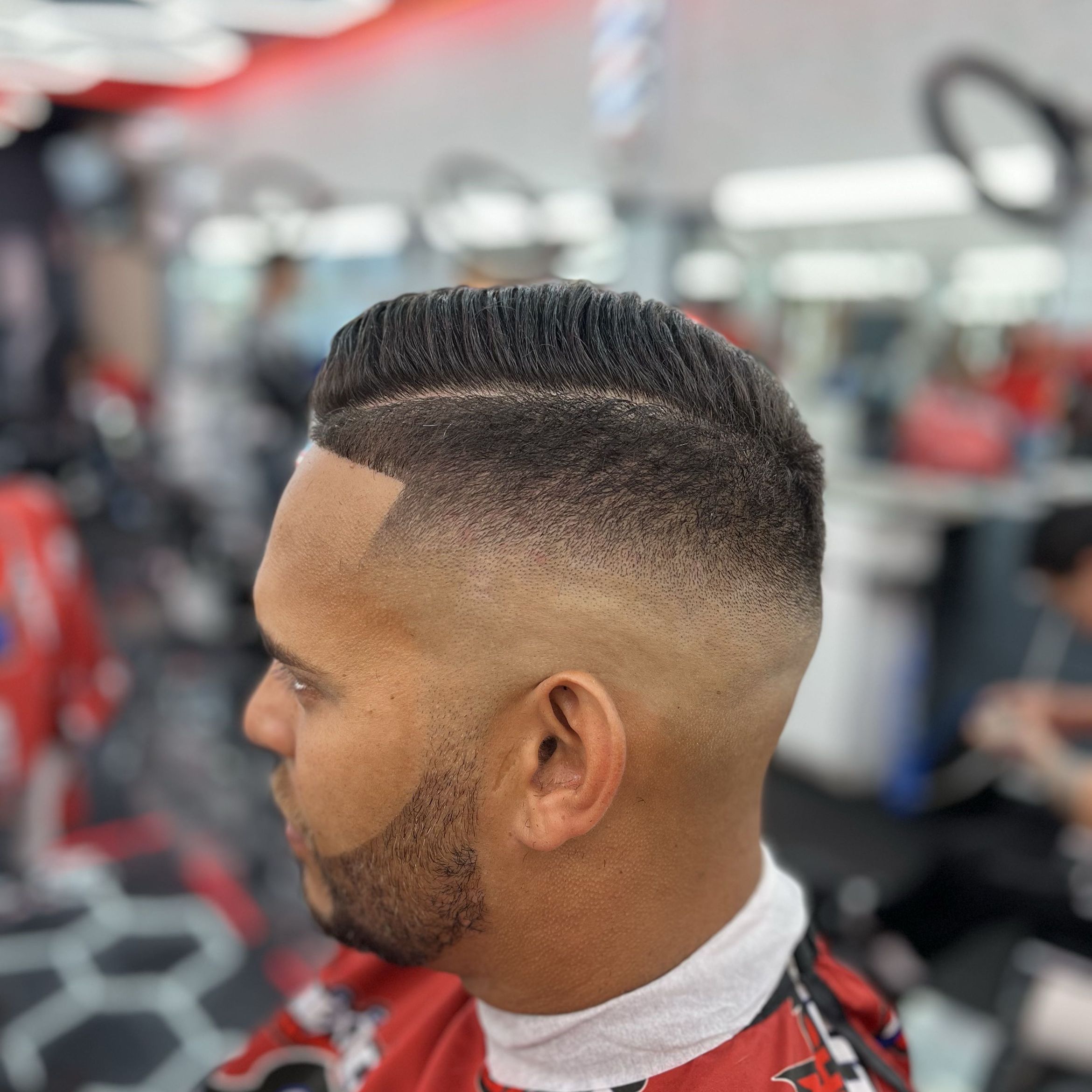 Classic pompadour with clean fade