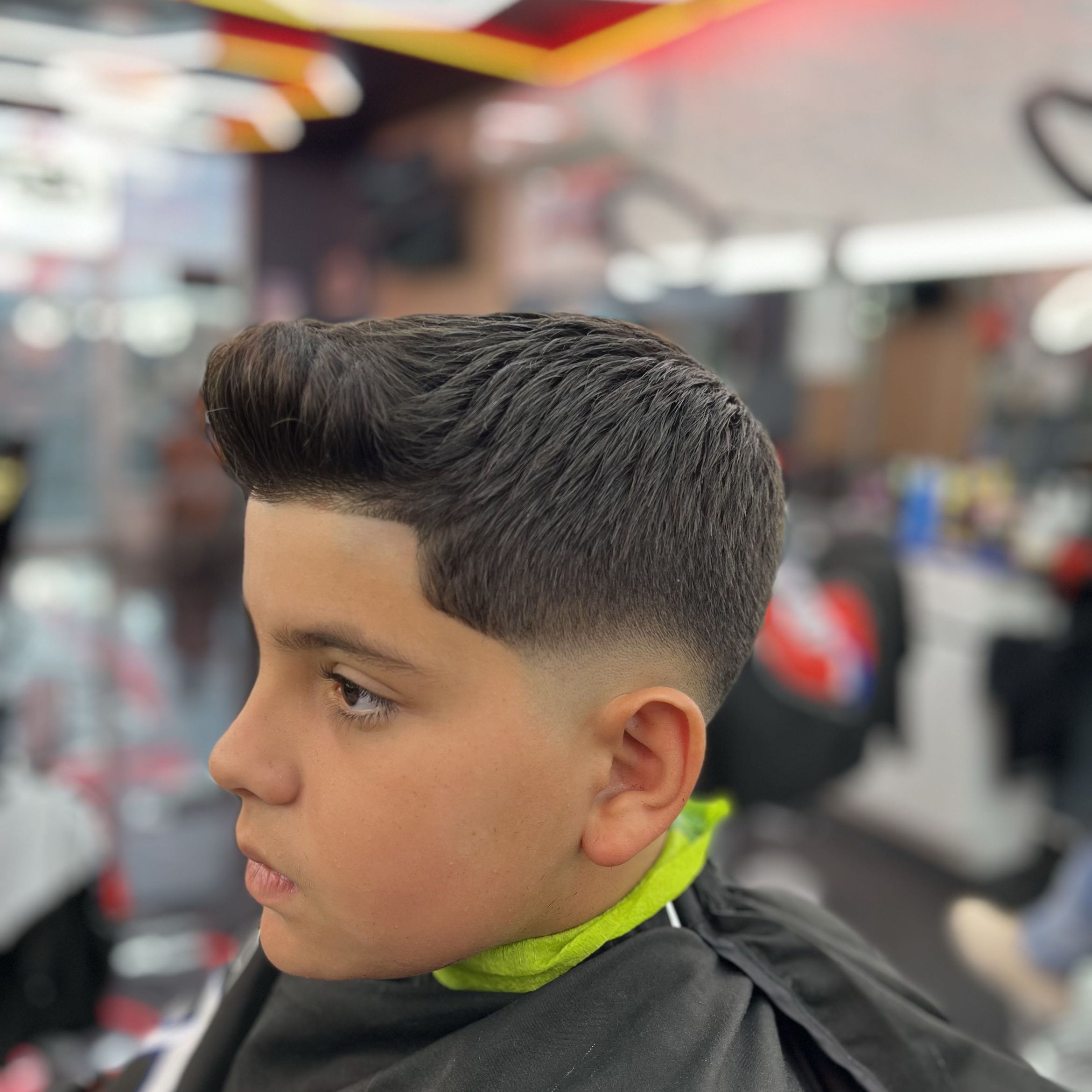Kid's quiff with tight fade